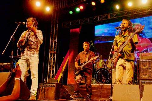 Bent (left) leading the band during a performance.