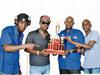 Alaska owner KiKi (second left), poses with the winning trophy with selectors (from left) Killa and Clarksie and Road Manager, Kernel. 