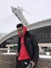 Genre Fluid, Billboard charting K'Coneil posing in front of Montreal's Olympic stadium