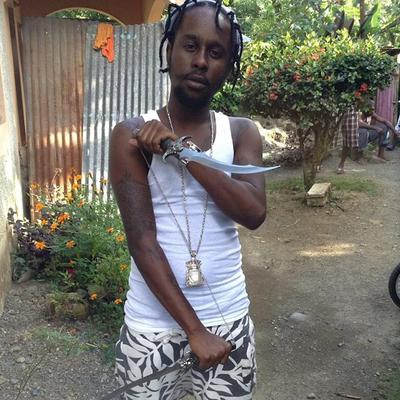 Unruly Boss Popcaan Showing Off his Blades